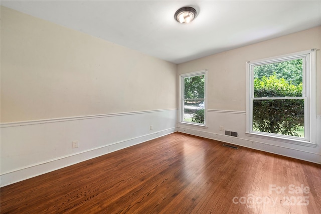 7010 Monroe Rd, Charlotte, NC 28212 - spare room with wood finished floors and baseboards
