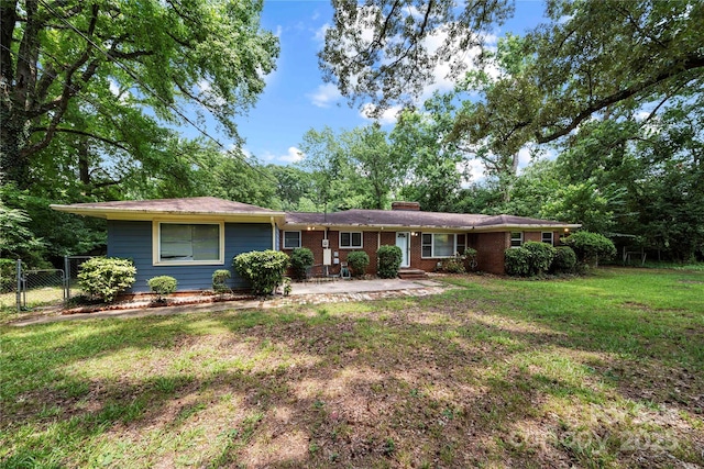 7010 Monroe Rd, Charlotte, NC 28212 - ranch-style home featuring a chimney, a patio, and brick siding