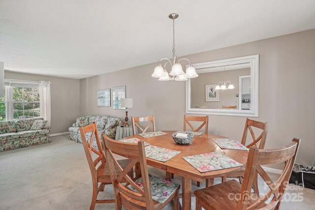 25 Hazel Ct, Brevard, NC 28712 - dining room featuring a chandelier and light colored carpet