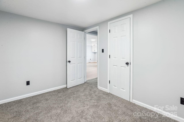 201 Hoyle Cir, Gastonia, NC 28052 - unfurnished bedroom with carpet floors and baseboards
