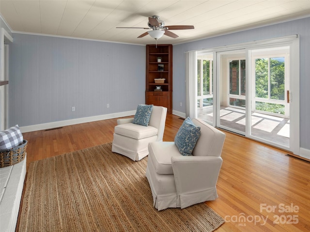 30 Belleview Rd, Waynesville, NC 28786 - living area with crown molding, light wood finished floors, and ceiling fan