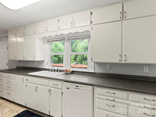30 Belleview Rd, Waynesville, NC 28786 - kitchen with white dishwasher, dark countertops, light tile patterned floors, and white cabinetry