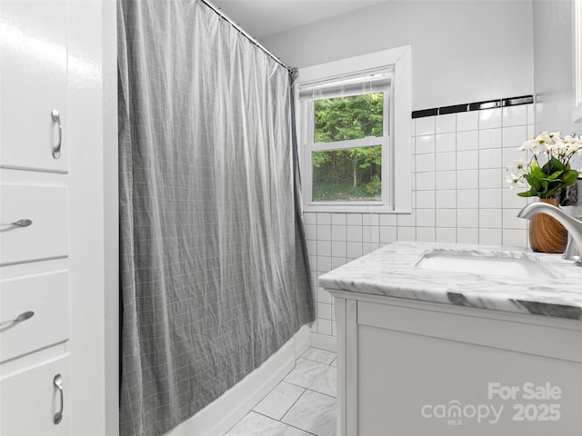 30 Belleview Rd, Waynesville, NC 28786 - full bath with vanity, marble finish floors, and tile walls