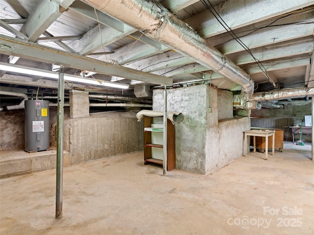 30 Belleview Rd, Waynesville, NC 28786 - unfinished below grade area with water heater