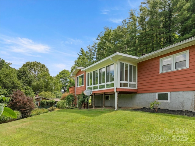 30 Belleview Rd, Waynesville, NC 28786 - back of property with a sunroom and a yard