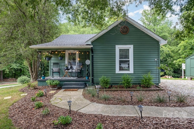1114 Mountain St, Kannapolis, NC 28081 - view of front of home featuring covered porch and a shingled roof