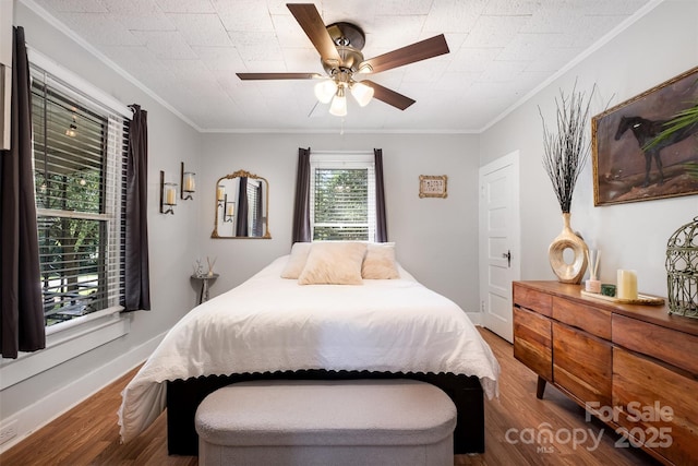 1114 Mountain St, Kannapolis, NC 28081 - bedroom with wood finished floors, ornamental molding, and a ceiling fan