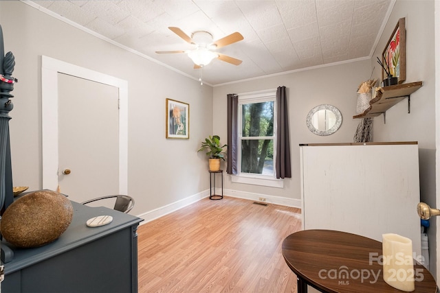 1114 Mountain St, Kannapolis, NC 28081 - home office featuring crown molding, light wood-style flooring, and ceiling fan
