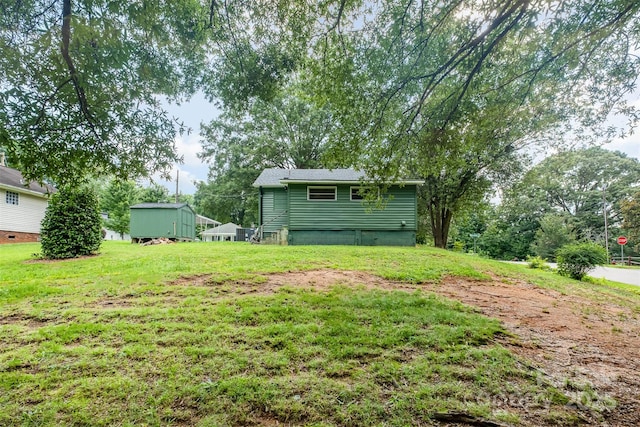 1114 Mountain St, Kannapolis, NC 28081 - view of green lawn featuring an outdoor structure