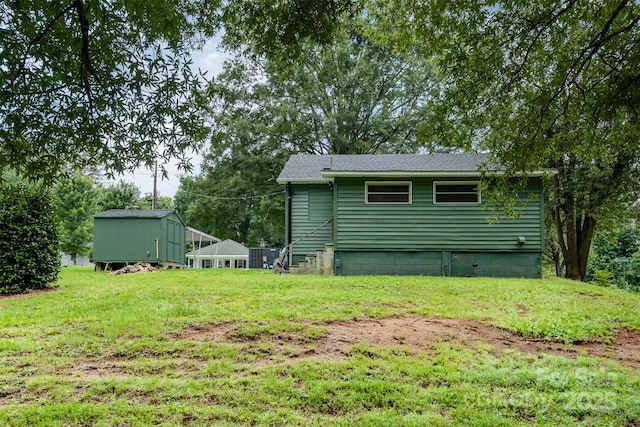 1114 Mountain St, Kannapolis, NC 28081 - rear view of property with a yard and roof with shingles