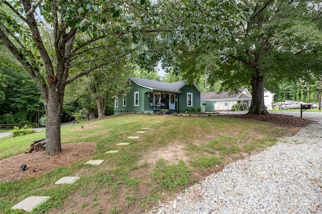 1114 Mountain St, Kannapolis, NC 28081 - view of front of home with covered porch and a front yard
