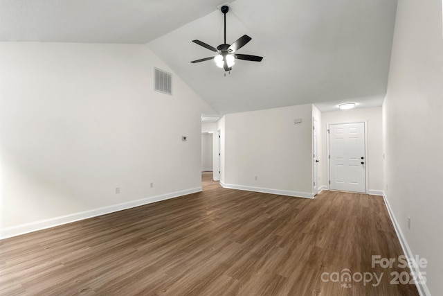 2210 Dawn Rdg, Monroe, NC 28110 - unfurnished living room featuring a ceiling fan, wood finished floors, and lofted ceiling