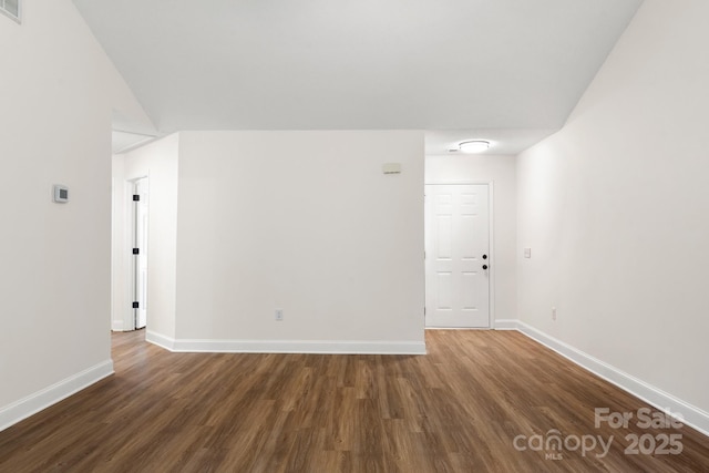 2210 Dawn Rdg, Monroe, NC 28110 - unfurnished room with wood finished floors and baseboards