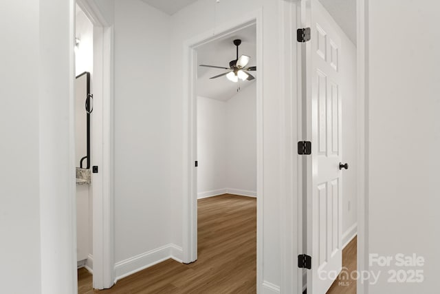 2210 Dawn Rdg, Monroe, NC 28110 - hallway with wood finished floors and baseboards