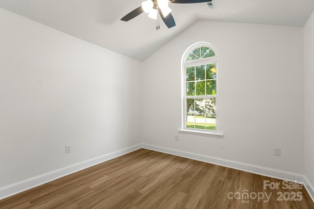 2210 Dawn Rdg, Monroe, NC 28110 - spare room featuring ceiling fan, wood finished floors, and lofted ceiling