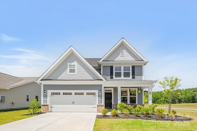 1302 Black Walnut St, Monroe, NC 28112 - craftsman house with a porch, driveway, a front yard, a garage, and brick siding