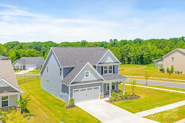 1302 Black Walnut St, Monroe, NC 28112 - view of front of house with concrete driveway, a garage, and a shingled roof