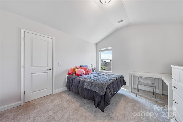 1302 Black Walnut St, Monroe, NC 28112 - carpeted bedroom with lofted ceiling and a desk