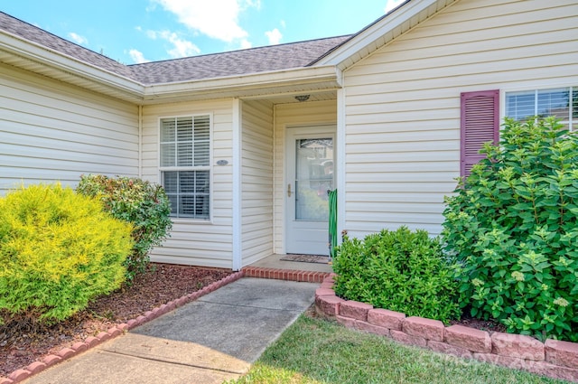 1975 8th Street Ln SE, Hickory, NC 28602 - view of exterior entry with roof with shingles