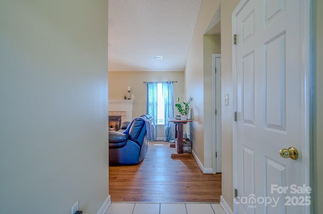 1975 8th Street Ln SE, Hickory, NC 28602 - corridor featuring baseboards and light tile patterned flooring