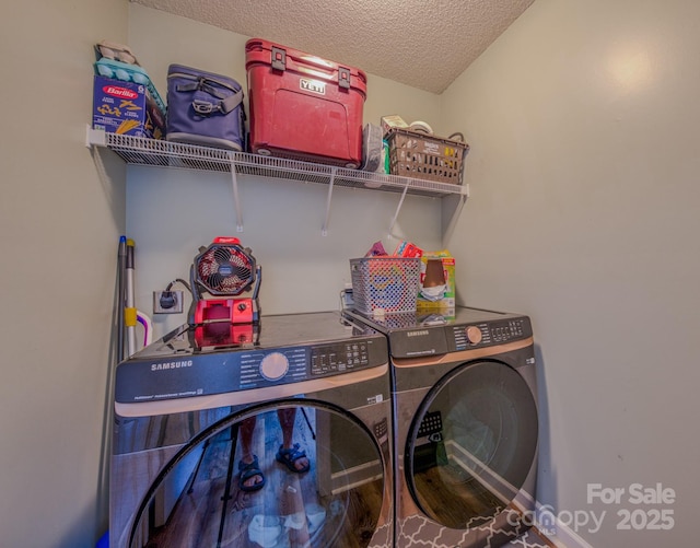 1975 8th Street Ln SE, Hickory, NC 28602 - laundry room featuring washer and clothes dryer and a textured ceiling