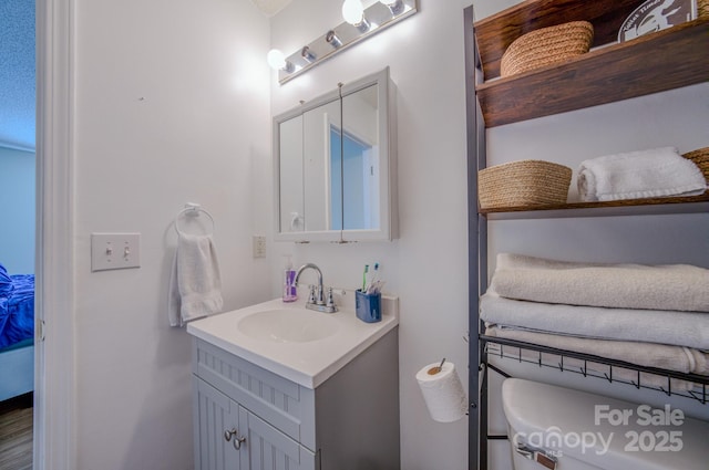 1975 8th Street Ln SE, Hickory, NC 28602 - bathroom featuring vanity and toilet