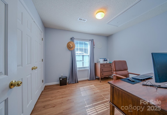 1975 8th Street Ln SE, Hickory, NC 28602 - office area featuring attic access, light wood-style floors, and a textured ceiling