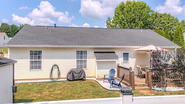 1975 8th Street Ln SE, Hickory, NC 28602 - rear view of property featuring a wooden deck, a shingled roof, and a lawn