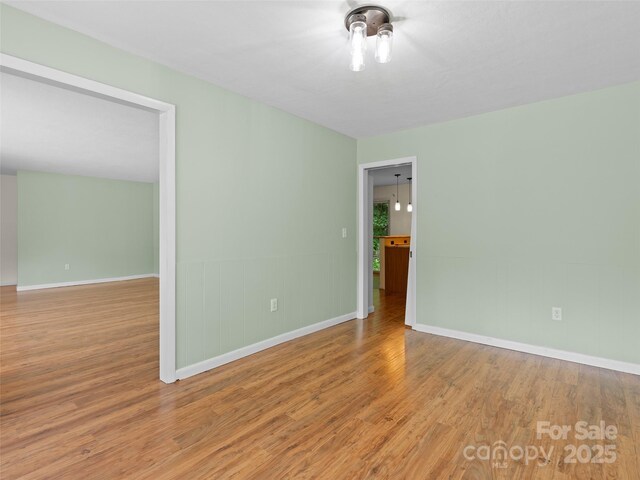 71 Auburn Park Dr, Waynesville, NC 28786 - spare room with wood finished floors and baseboards
