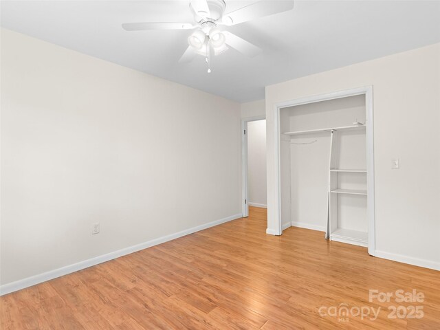 71 Auburn Park Dr, Waynesville, NC 28786 - unfurnished bedroom featuring light wood-style floors, a closet, and ceiling fan