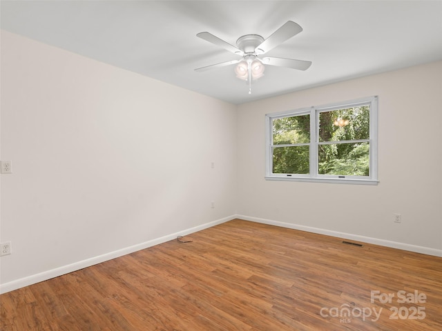 71 Auburn Park Dr, Waynesville, NC 28786 - unfurnished room featuring wood finished floors and a ceiling fan