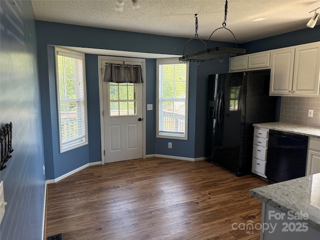 4870 Beckel Rd, Winston Salem, NC 27127 - kitchen featuring black appliances, dark wood finished floors, white cabinetry, backsplash, and a textured ceiling