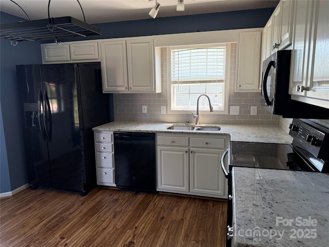 4870 Beckel Rd, Winston Salem, NC 27127 - kitchen with black appliances, dark wood-style flooring, and white cabinetry