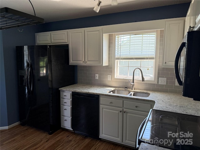 4870 Beckel Rd, Winston Salem, NC 27127 - kitchen with black appliances, dark wood-type flooring, decorative backsplash, and white cabinets