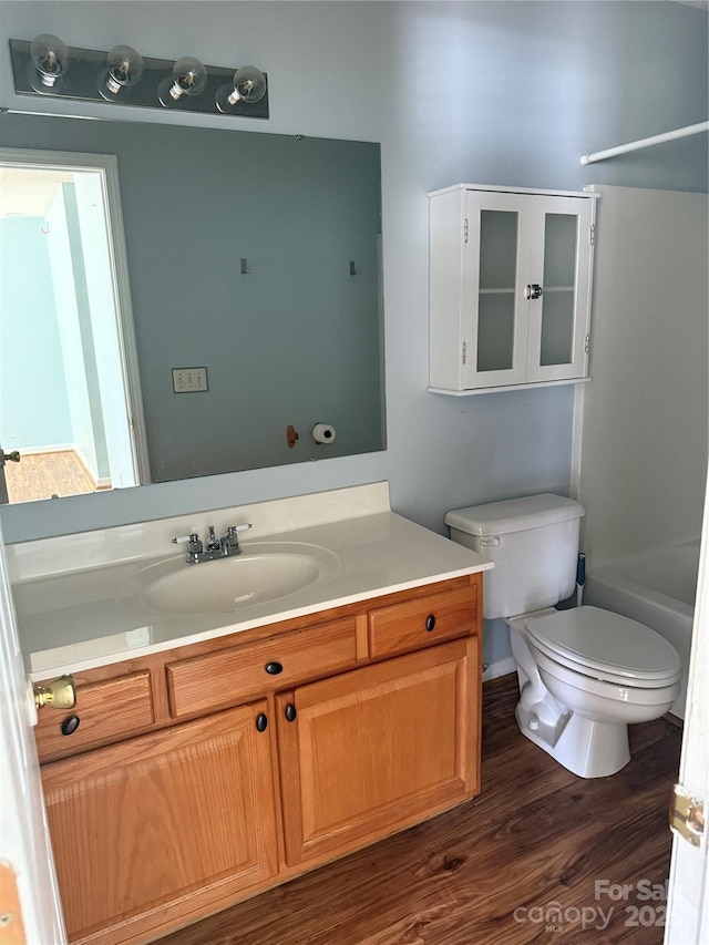 4870 Beckel Rd, Winston Salem, NC 27127 - full bath with vanity and wood finished floors