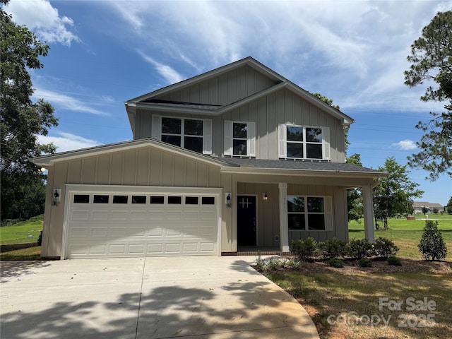 5613 Morgan Mill Rd, Monroe, NC 28110 - view of front of property with board and batten siding, driveway, and a porch
