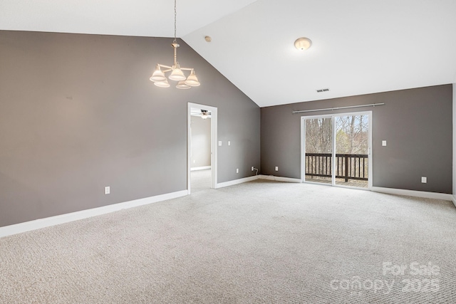 64 Foxden Dr Unit 201, Fletcher, NC 28732 - unfurnished room featuring vaulted ceiling, a chandelier, and light carpet