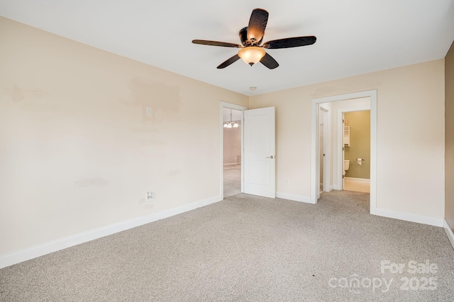 64 Foxden Dr Unit 201, Fletcher, NC 28732 - unfurnished bedroom featuring light carpet, connected bathroom, and ceiling fan
