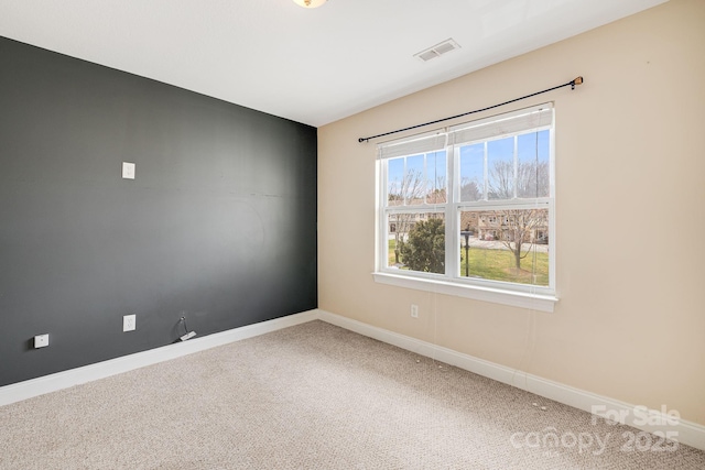 64 Foxden Dr Unit 201, Fletcher, NC 28732 - spare room featuring carpet floors and baseboards