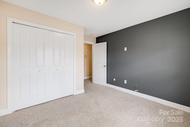 64 Foxden Dr Unit 201, Fletcher, NC 28732 - unfurnished bedroom featuring carpet flooring and a closet