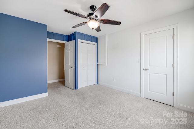 64 Foxden Dr Unit 201, Fletcher, NC 28732 - unfurnished bedroom featuring carpet, a closet, and ceiling fan