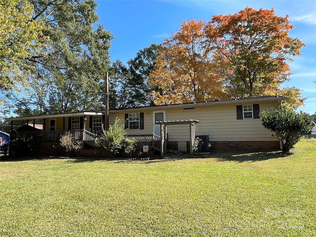 3403 Beaty Rd, Gastonia, NC 28056 - rear view of house featuring a lawn