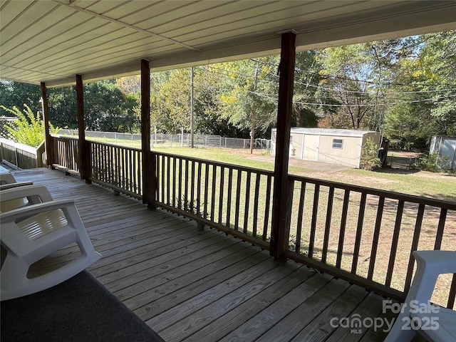 3403 Beaty Rd, Gastonia, NC 28056 - deck with a fenced backyard and a storage unit