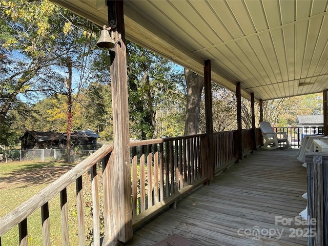 3403 Beaty Rd, Gastonia, NC 28056 - wooden porch featuring view of wooded area