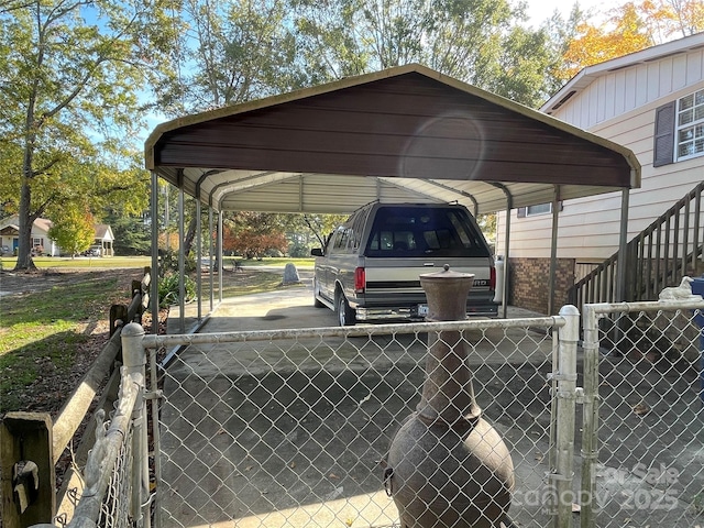 3403 Beaty Rd, Gastonia, NC 28056 - view of vehicle parking featuring a detached carport, a gate, stairway, and asphalt driveway