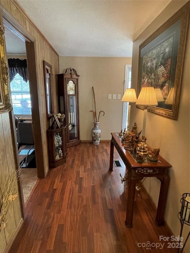3403 Beaty Rd, Gastonia, NC 28056 - corridor with dark wood-style floors and a textured ceiling
