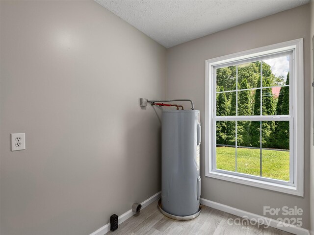 19 Cedar St, Canton, NC 28716 - utility room featuring electric water heater