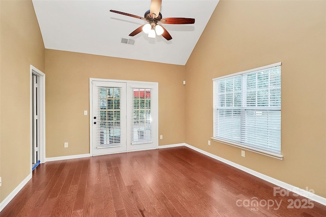 4580 Antelope Ln, Charlotte, NC 28269 - spare room with high vaulted ceiling, a ceiling fan, wood finished floors, and plenty of natural light