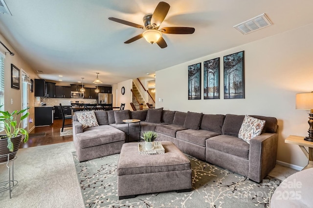 10920 Dapple Grey Ln, Charlotte, NC 28213 - living room featuring stairs and a ceiling fan