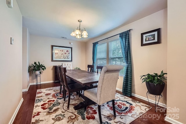 10920 Dapple Grey Ln, Charlotte, NC 28213 - dining room with a chandelier and wood finished floors